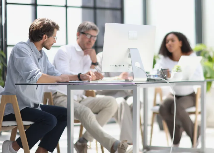 Office employees having conversation