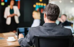 Man listening at meeting