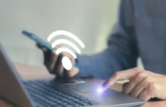 Using laptop with wifi symbol on screen