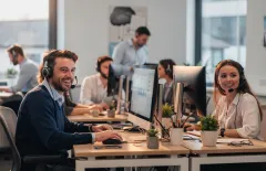 Employees using business phone system 
