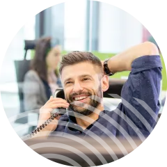 Man talking on phone in office