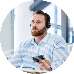 Man on phone using the Voice Payments Integrated Solution