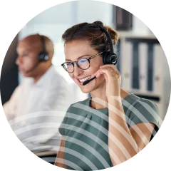 Woman on phone using the Zendesk Integrated Solution