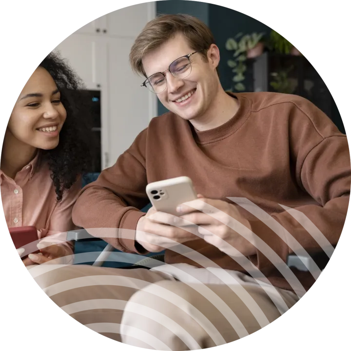 people on mobile phone donating to irish charity using communications solution