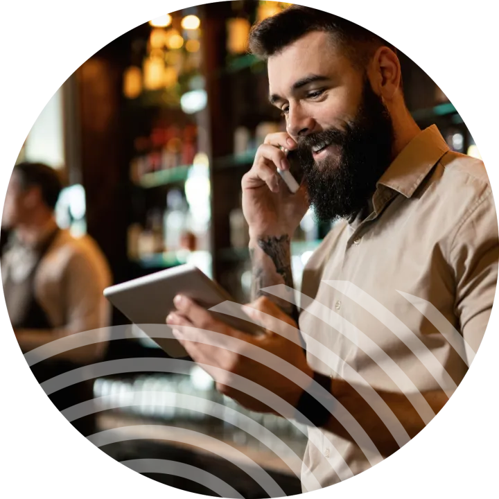 barman using irish phone and connectivity solution
