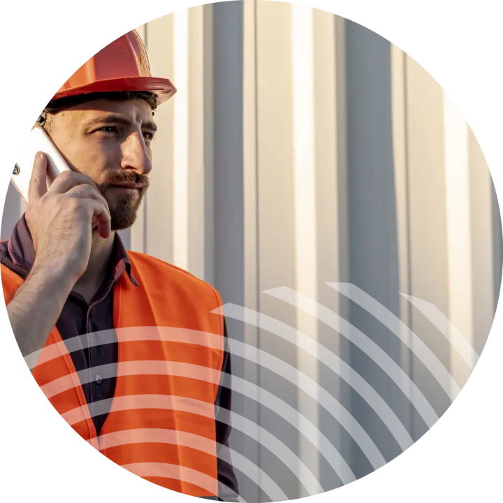 building site man talking on phone in ireland