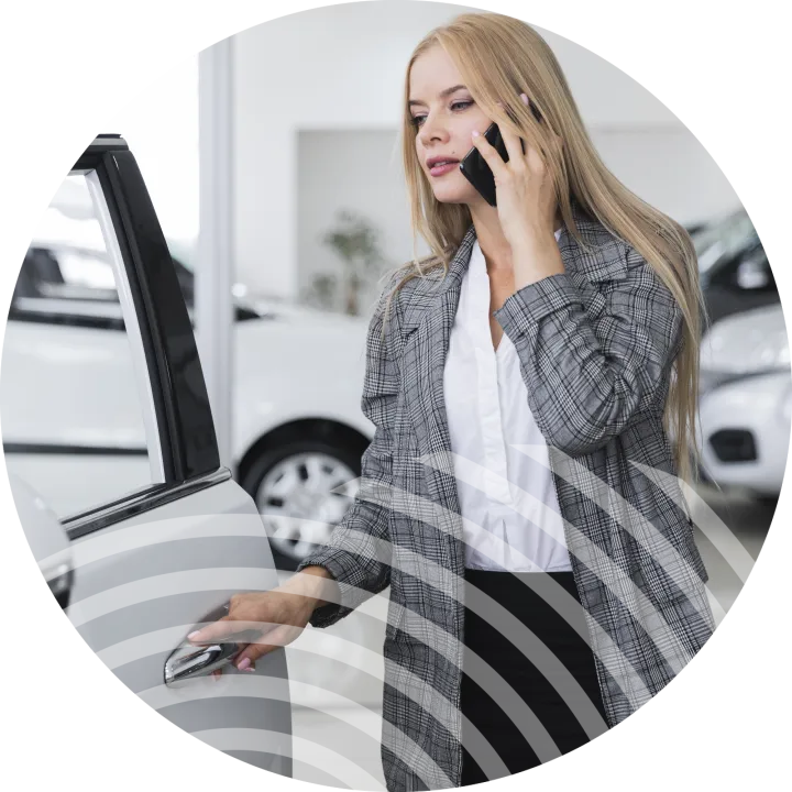 woman using irish phone solution in car dealership