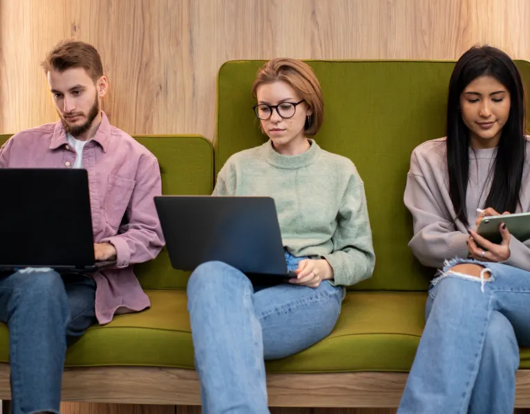 three people using multiple device types on secure managed WiFi network